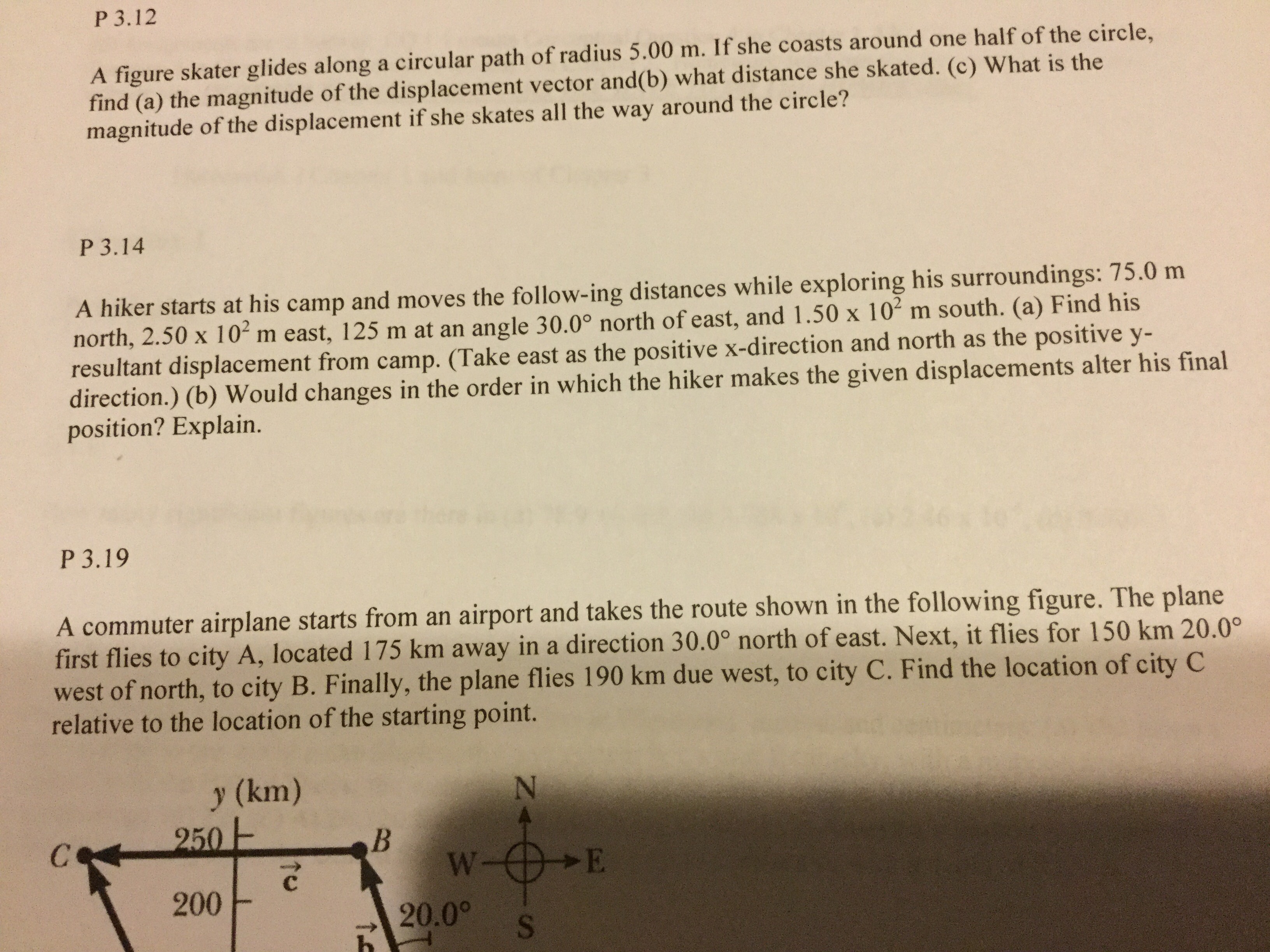 Answered: P 3.12 A figure skater glides along a… | bartleby